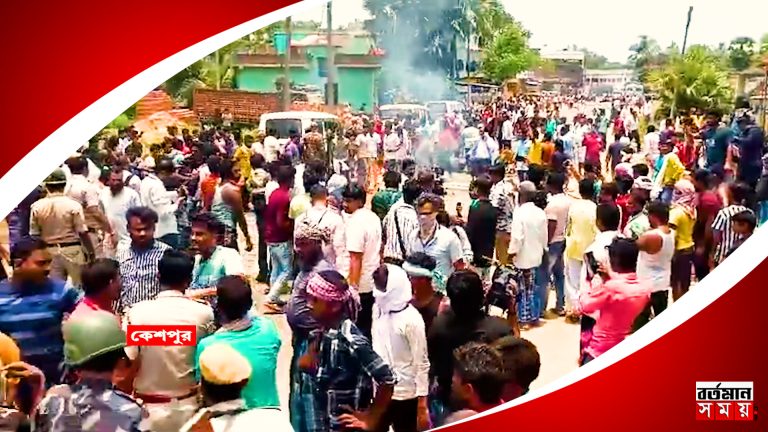 বাঁশ নিয়ে হিরণের গাড়ি আটকাল তৃণমূল, অগ্নিগর্ভ পরিস্থিতি, চাকার সামনে শুয়ে তুমুল বিক্ষোভ তৃণমূলের।